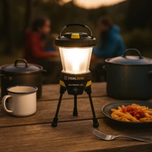 Goal Zero Lighthouse 600 solar camping gear lantern with 600 lumens illuminating outdoor picnic table for Outdoor Tech Lab testing