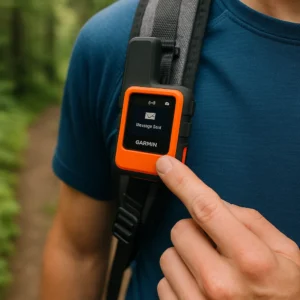 Garmin inReach Mini 2 lightweight satellite communicator clipped to backpack for hiking emergency messaging